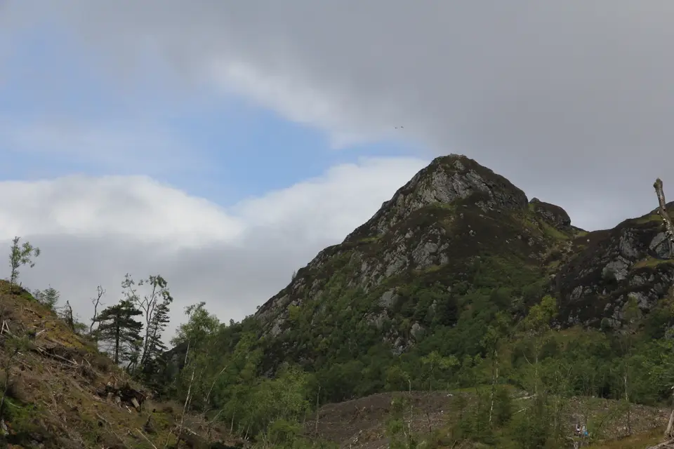 The pointed rocky top of Ben A'an seen from the south-east under broken cloud