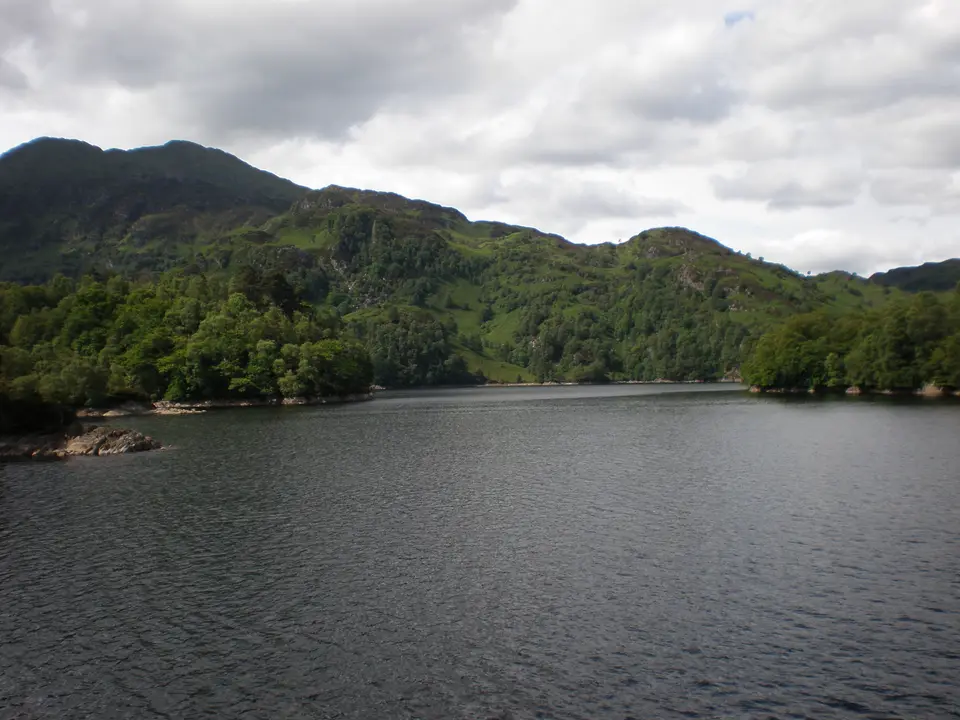 Ben Venue across the water of Loch Katrine on a calm day