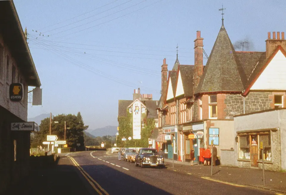 Main Street in Aberfoyle, with shops and cafes