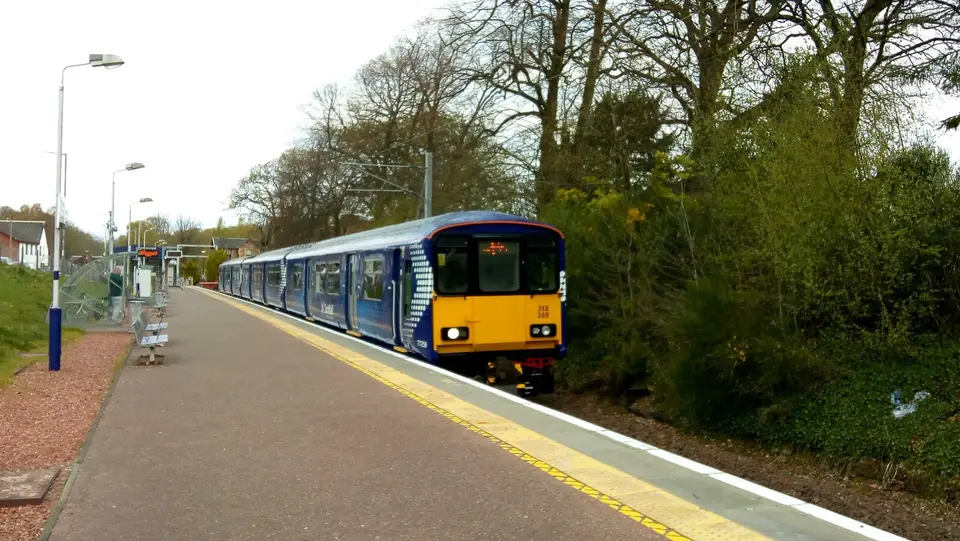 A ScotRail train waiting at the platform in Balloch station