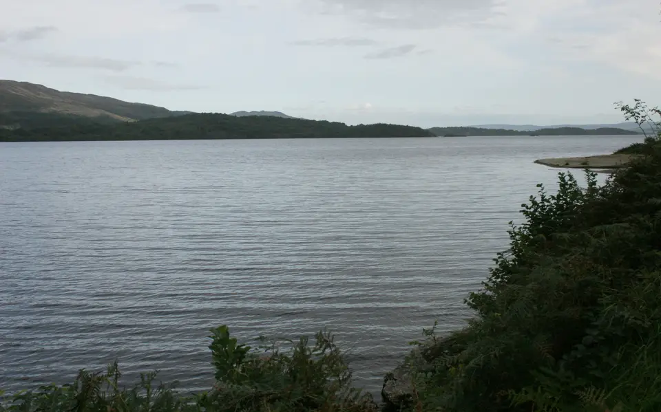 Loch Lomond seen from the shore south of Inverbeg with hills across the water