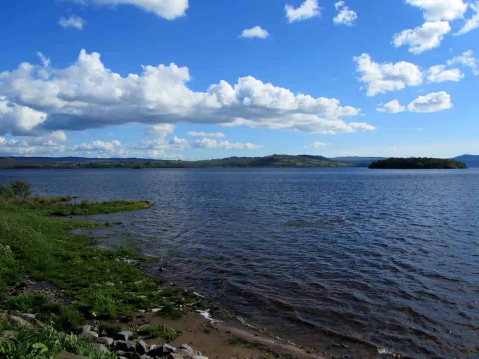 Loch Lomond from the Balmaha shore, with a wooded island on the horizon