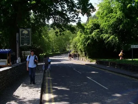 The main road through Balmaha village on Loch Lomond looking west