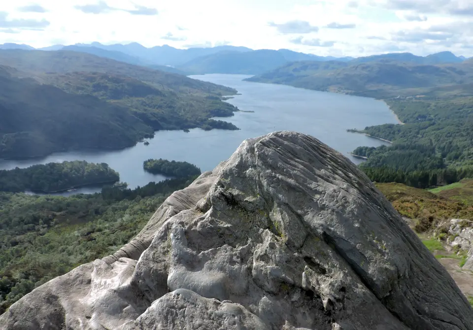 Loch Katrine and the Trossachs hills seen from a rock on the summit of Ben A’an